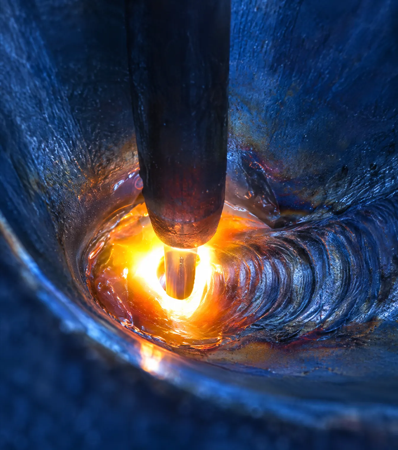 Same weld puddle through a Rod Shield blue lens