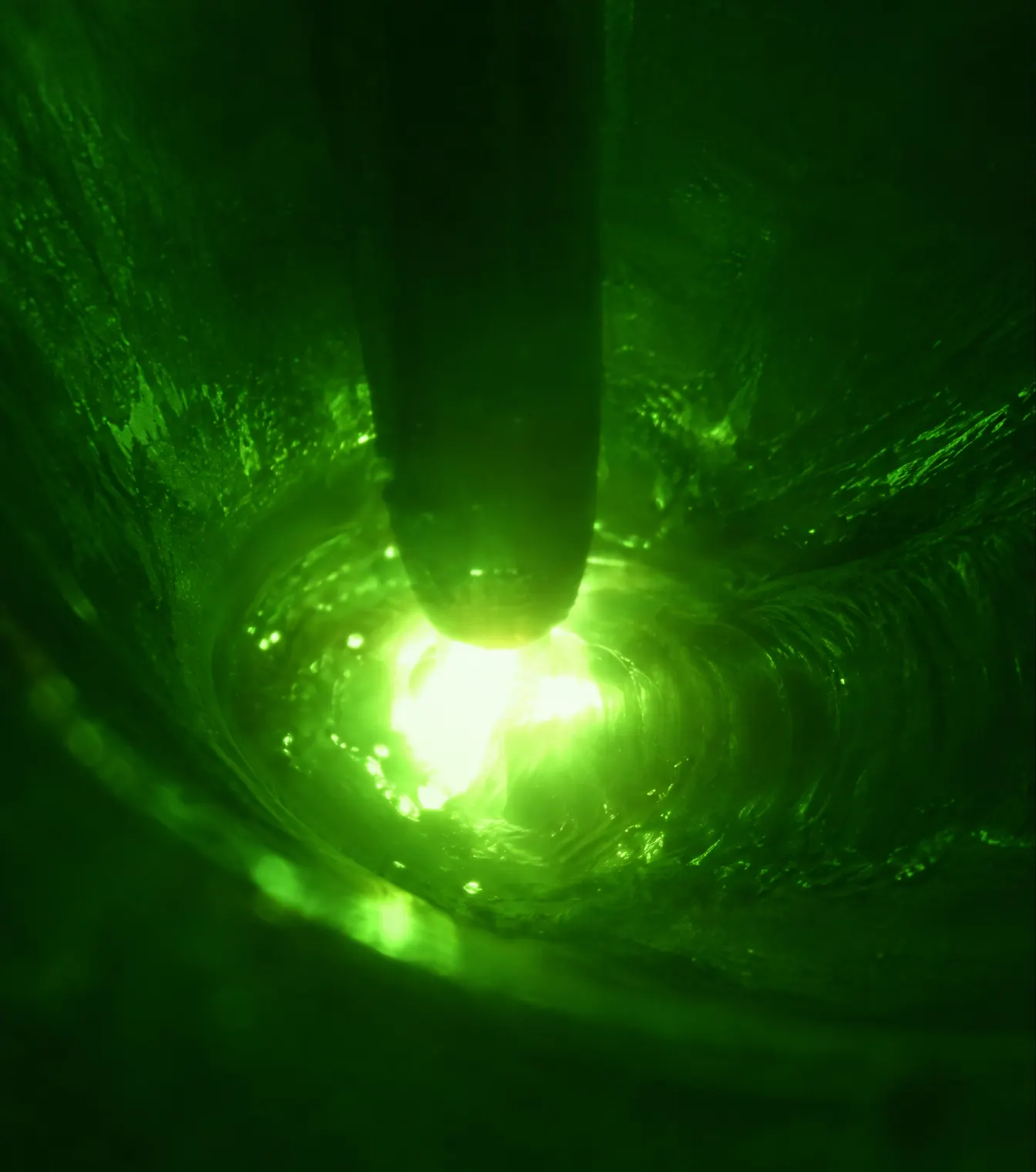 Weld puddle through a green filter
